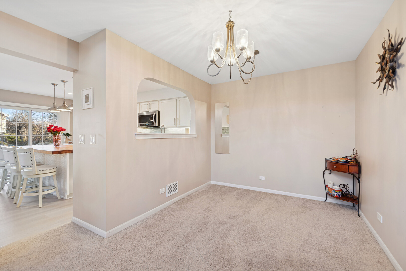 1301 Filly Lane Bartlett, IL 60103 - Photo 6 of 17 a view of a room with workspace and chandelier