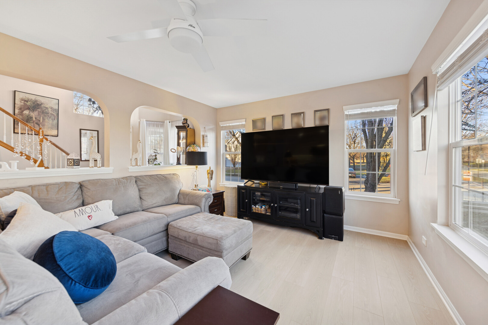 1301 Filly Lane Bartlett, IL 60103 - Photo 9 of 17 a living room with furniture and a flat screen tv