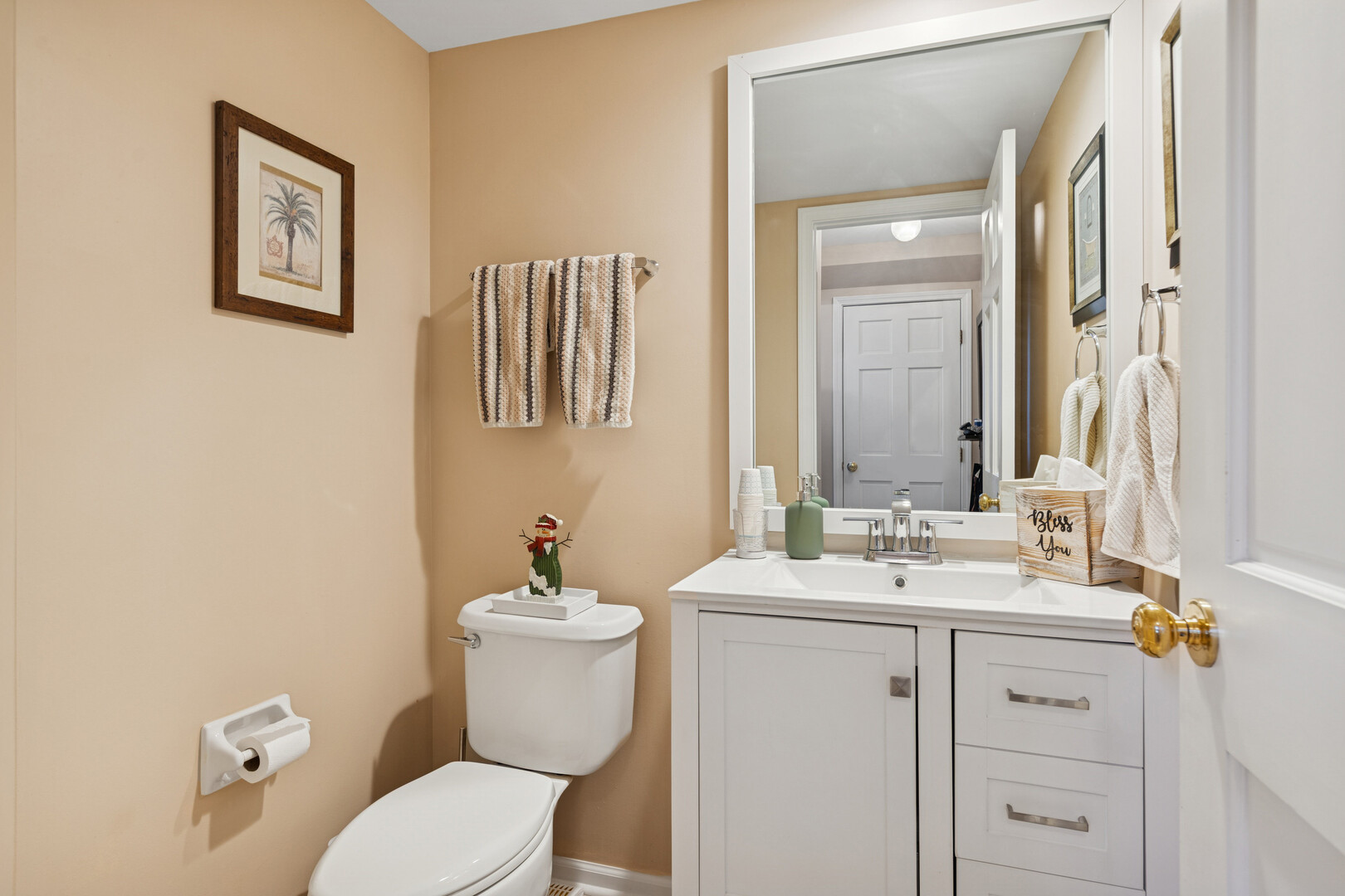 1301 Filly Lane Bartlett, IL 60103 - Photo 10 of 17 a bathroom with a toilet sink and mirror