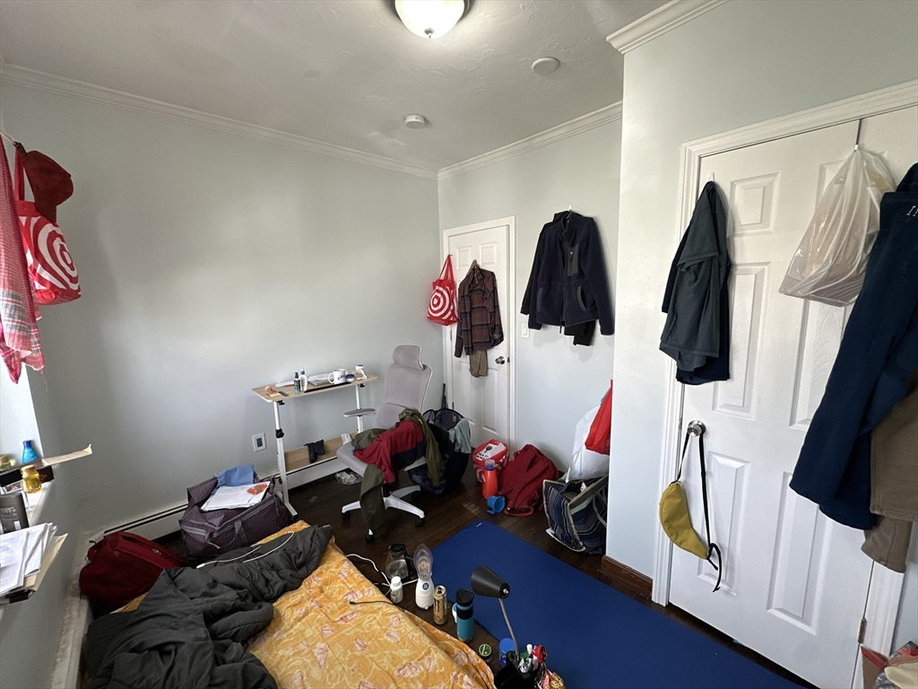 435 Walnut Avenue, Unit 10 Boston, MA 02119 - Photo 8 of 18 a view of a room with gym equipment