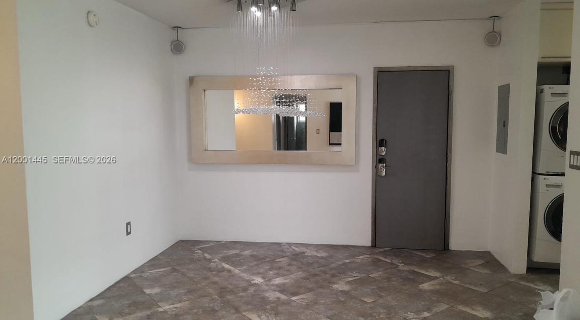 1300 Lincoln Road, Unit A301 Miami Beach, FL 33139 - Photo 15 of 23 a view of a storage & utility room with refrigerator