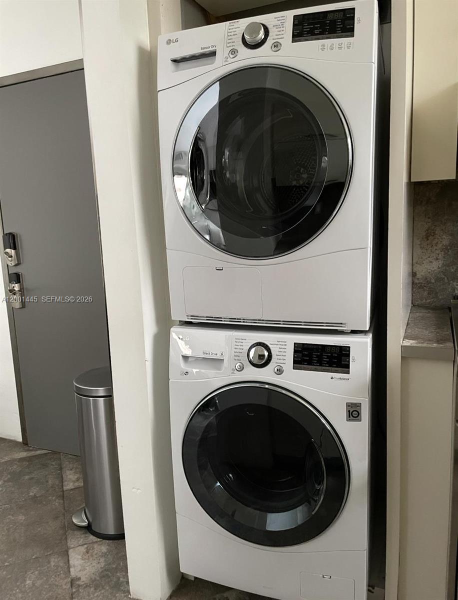 1300 Lincoln Road, Unit A301 Miami Beach, FL 33139 - Photo 18 of 23 a utility room with dryer and washer