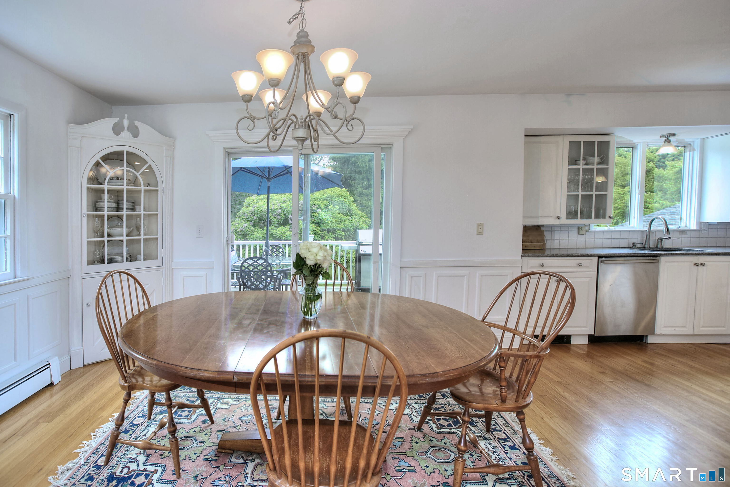 324 Ridge Road Orange, CT 06477 - Photo 7 of 38 a view of a dining room with furniture window and outside view