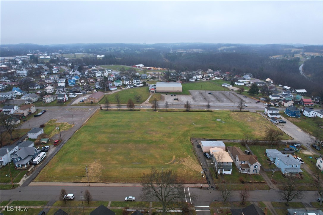3rd Street Northeast Carrollton, OH 44615 - Photo 7 of 11 Aerial view of property and surrounding area with nearby suburban area