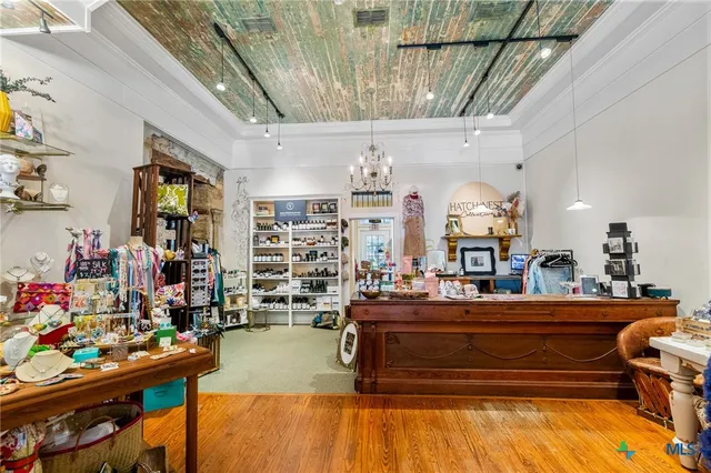 a room with lots of wooden furniture