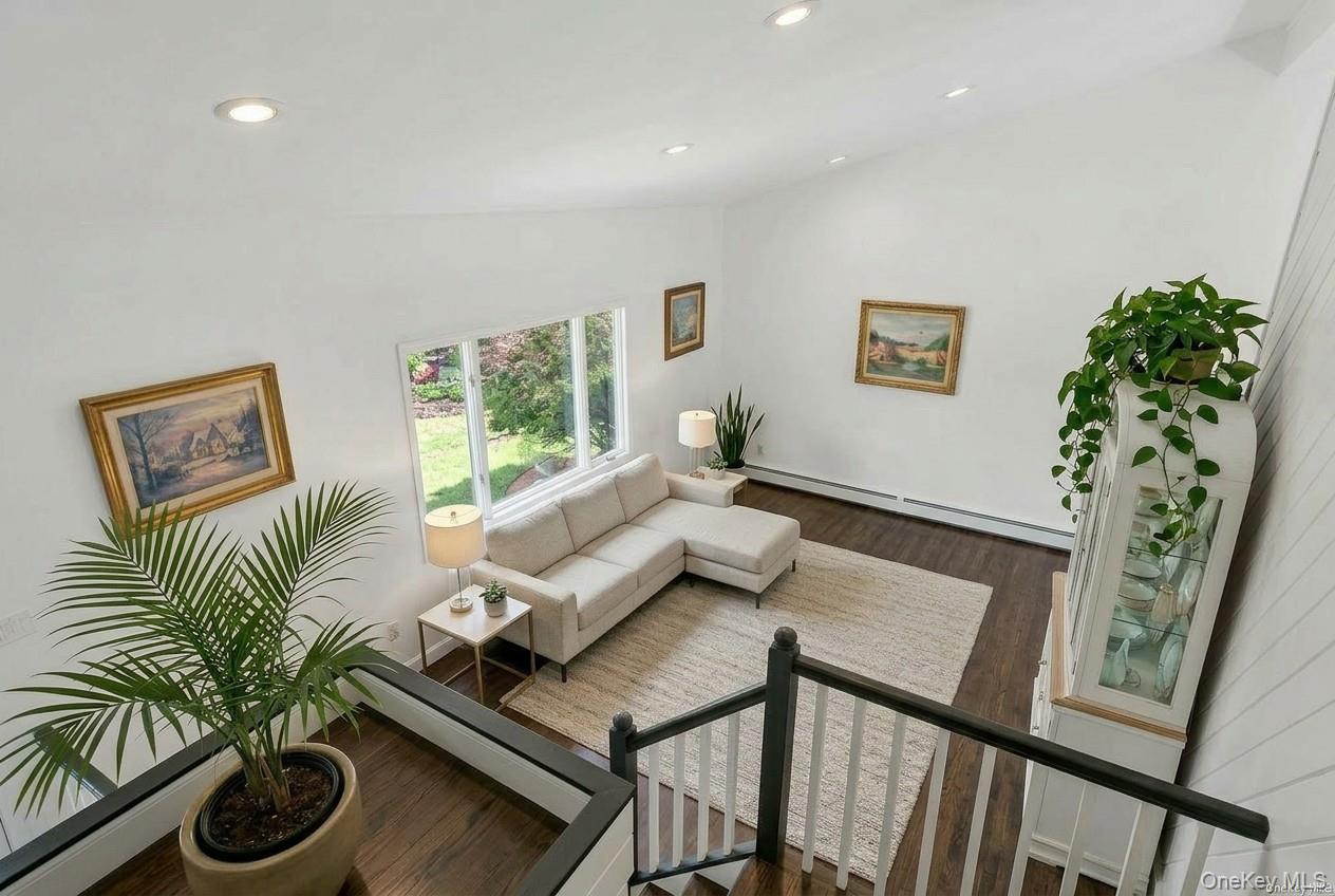 449 West Mombasha Road Monroe, NY 10950 - Photo 3 of 39 a living room with furniture and a potted plant