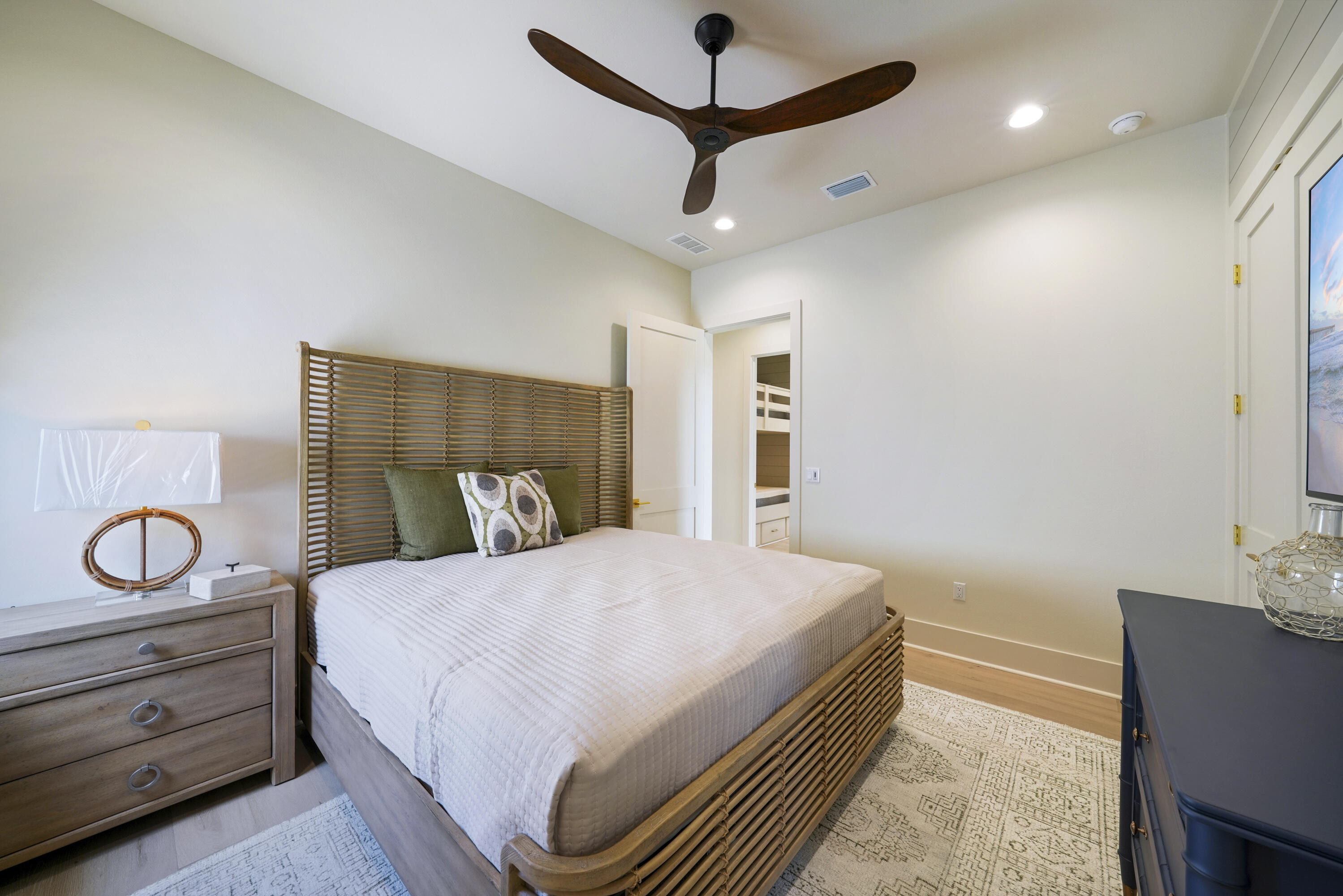 56 Sea Croft Cove Santa Rosa Beach, FL 32459 - Photo 51 of 65 a bedroom with a bed and a table