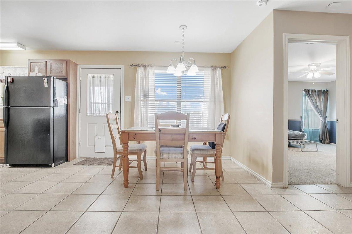903 Xavier Street Lubbock, TX 79403 - Photo 14 of 28 a dining room well furnished