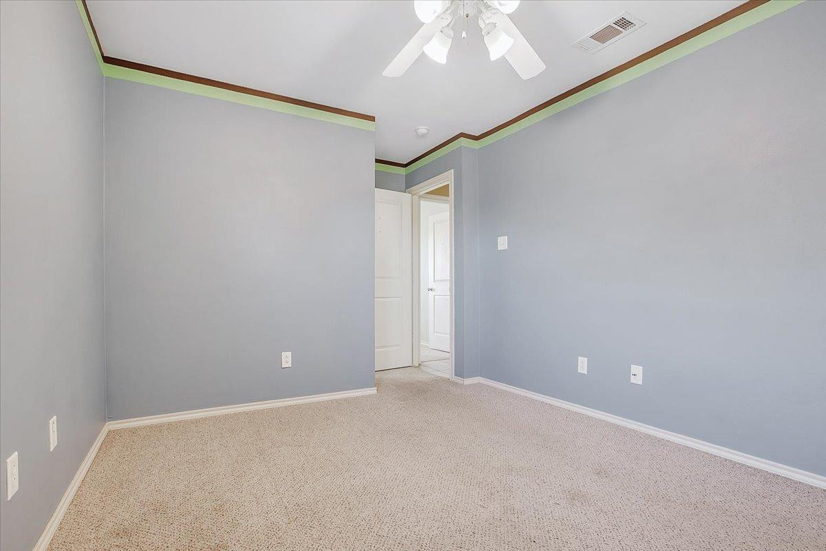 903 Xavier Street Lubbock, TX 79403 - Photo 7 of 28 a view of an empty room