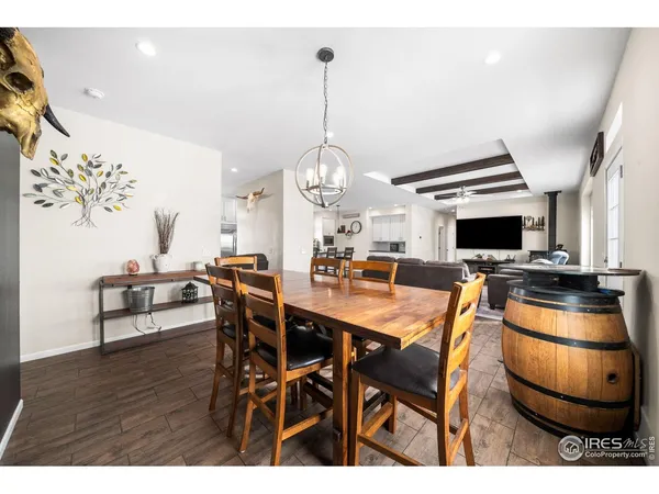 a kitchen with granite countertop stainless steel appliances a sink and cabinets