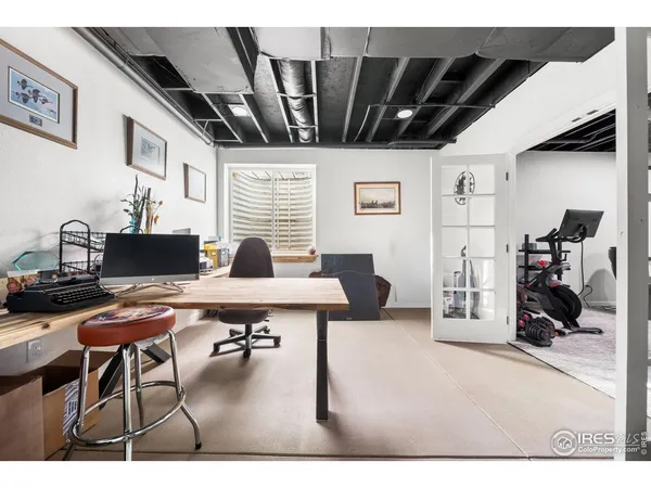 a roof view with table and chairs