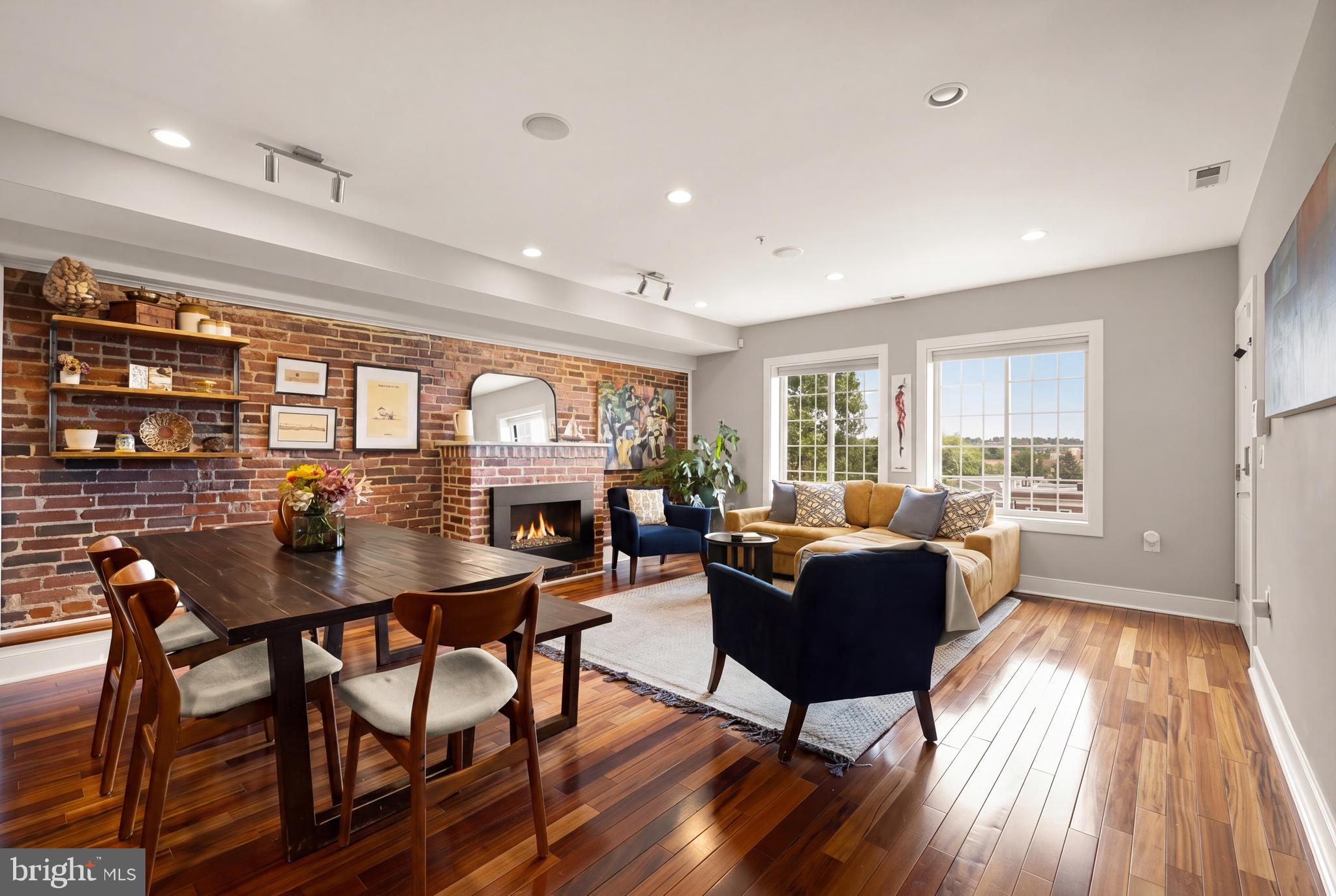 3602 16th Street Northwest, Unit 4 Washington, DC 20010 - Photo 4 of 50 Sun-filled living space with exposed brick wall