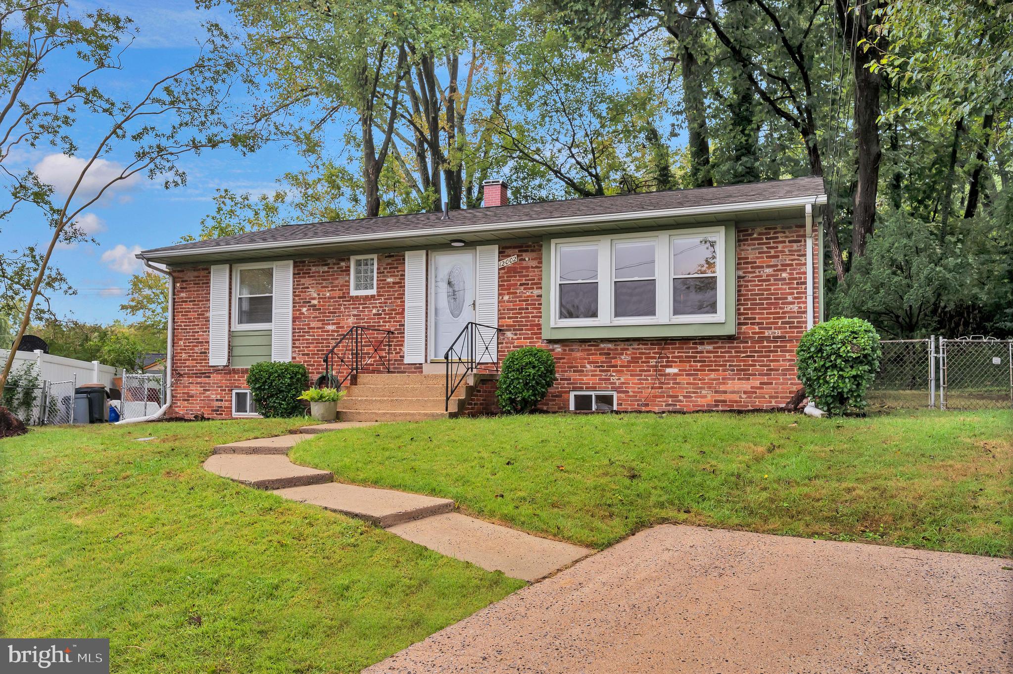 12002 Cook Court Silver Spring, MD 20902 - Photo 31 of 31 front view of a house with a yard