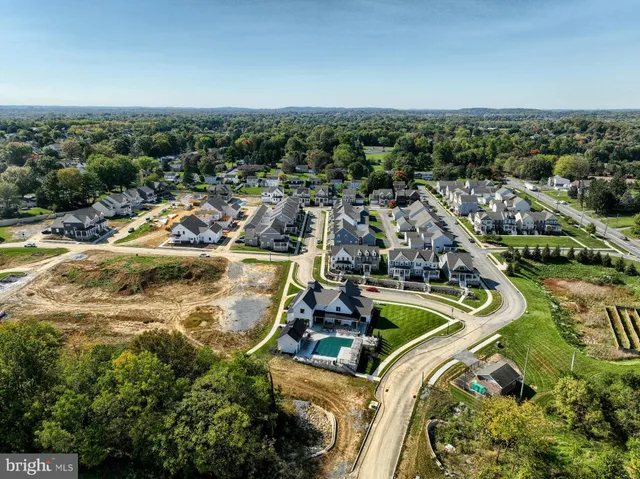 a view of a swimming pool with a lake view