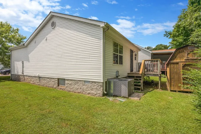 a front view of house with yard and seating