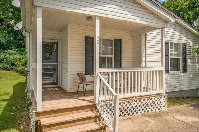 a view of a house with a large window