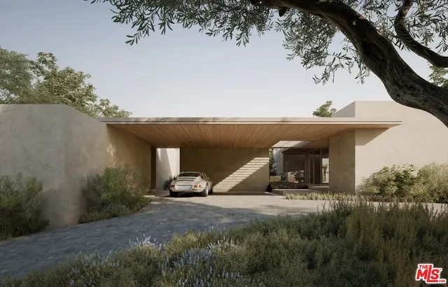 a view of a tiny house with yard