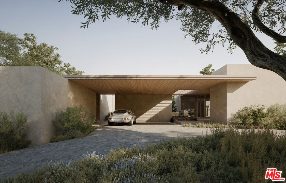 a view of a tiny house with yard