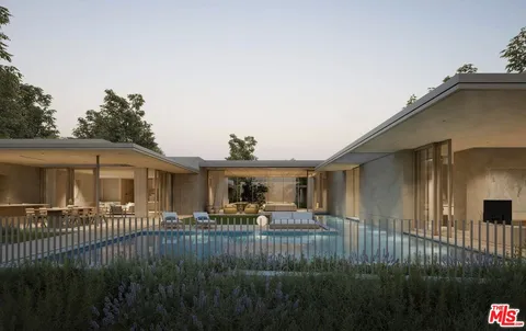 a view of a house with backyard and porch
