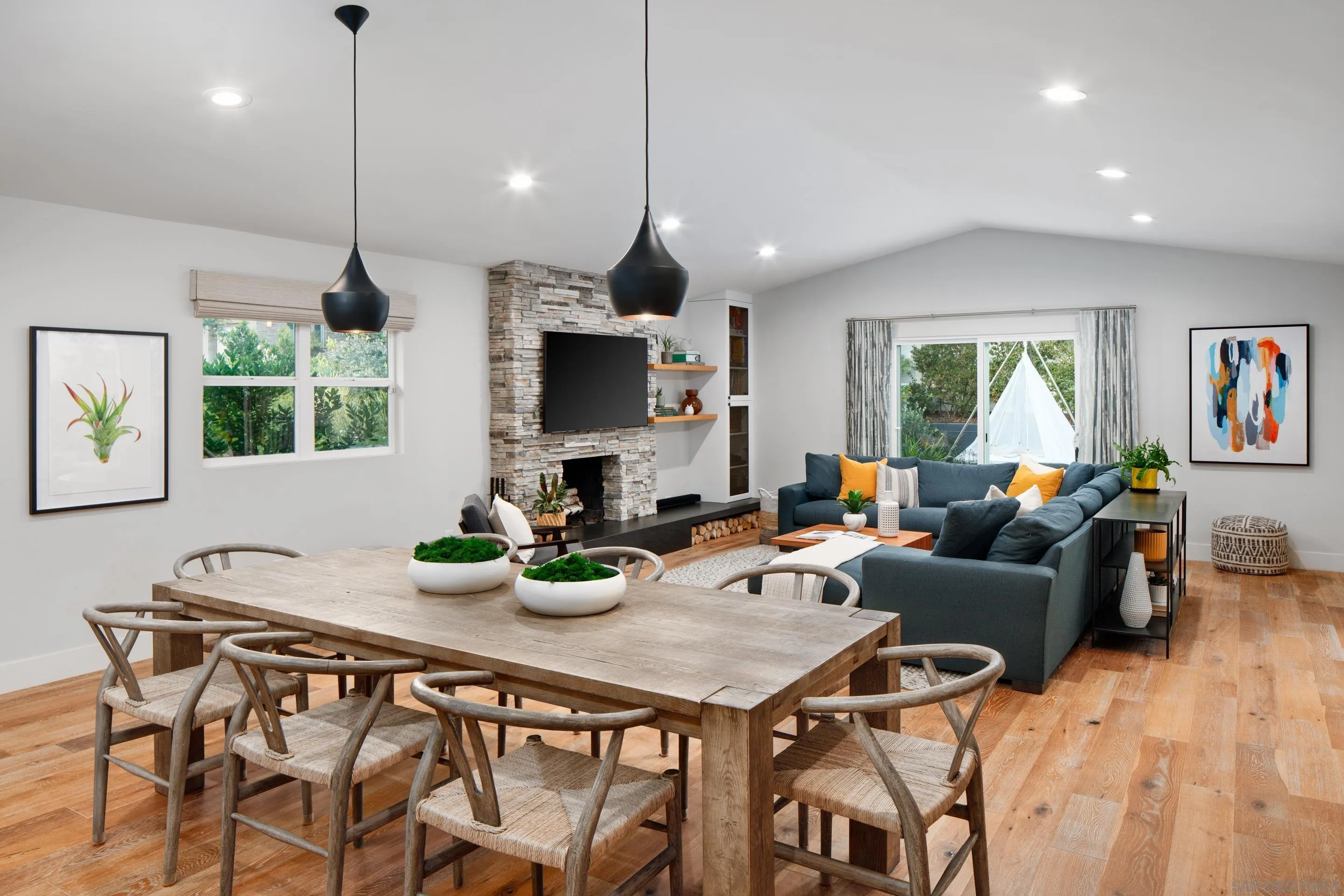 775 Normandy Road Encinitas, CA 92024 - Photo 4 of 44 a living room with furniture a flat screen tv and a large window