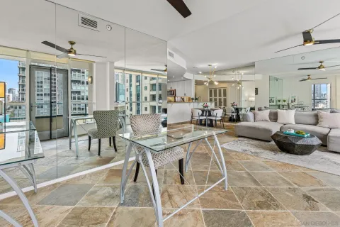 a living room with lots of furniture and a table
