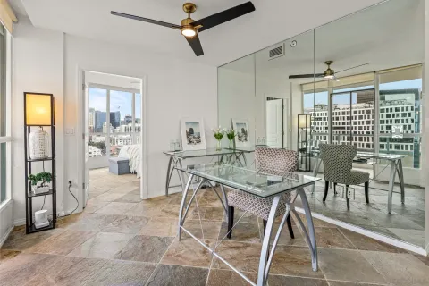 a view of a dining room with furniture window and outside view