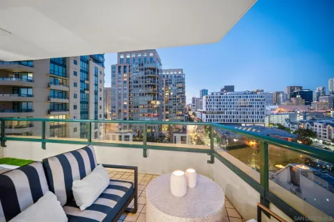 a view of a balcony with city view