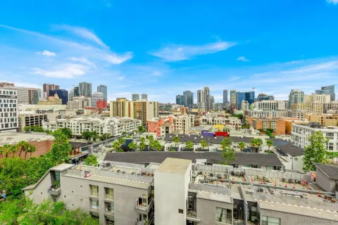 a view of city with tall buildings