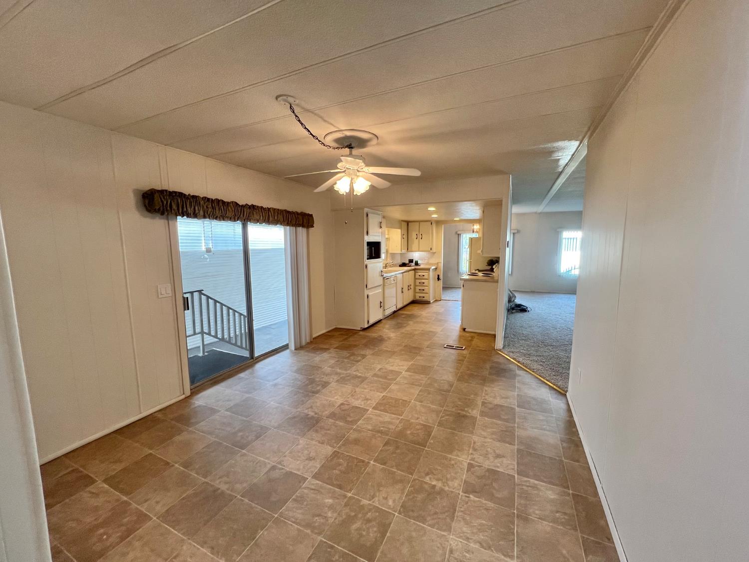 3955 Coffee Road, Unit 53 Modesto, CA 95355 - Photo 20 of 39 a view of a hallway with furniture