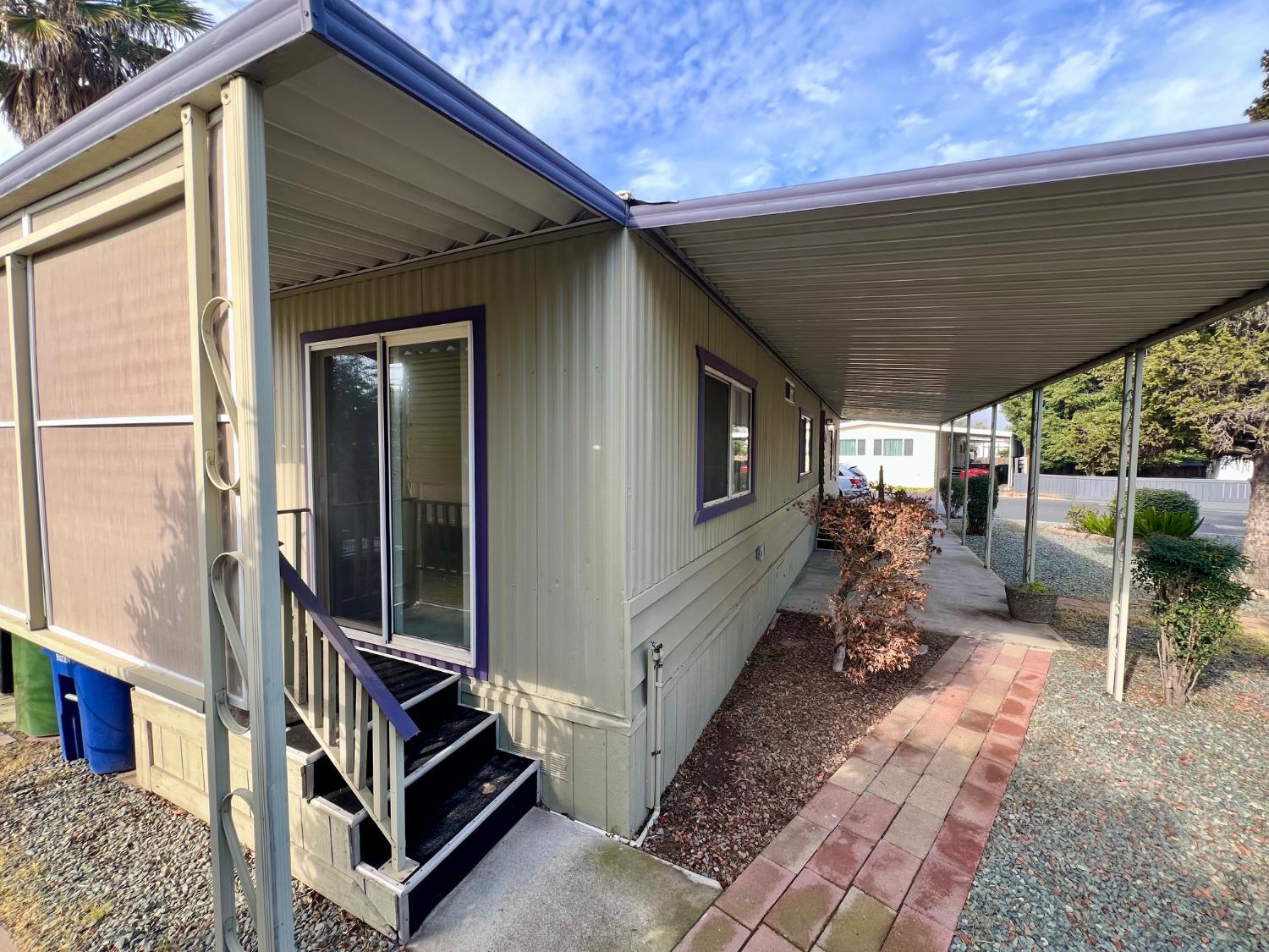 3955 Coffee Road, Unit 53 Modesto, CA 95355 - Photo 30 of 39 a backyard of a house with seating space