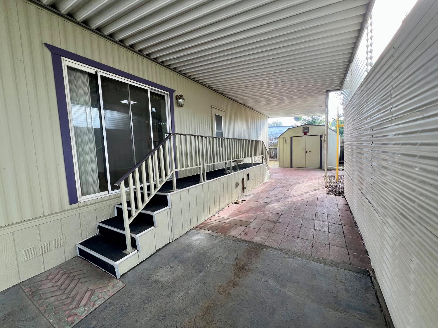 3955 Coffee Road, Unit 53 Modesto, CA 95355 - Photo 32 of 39 a view of a balcony with stairs