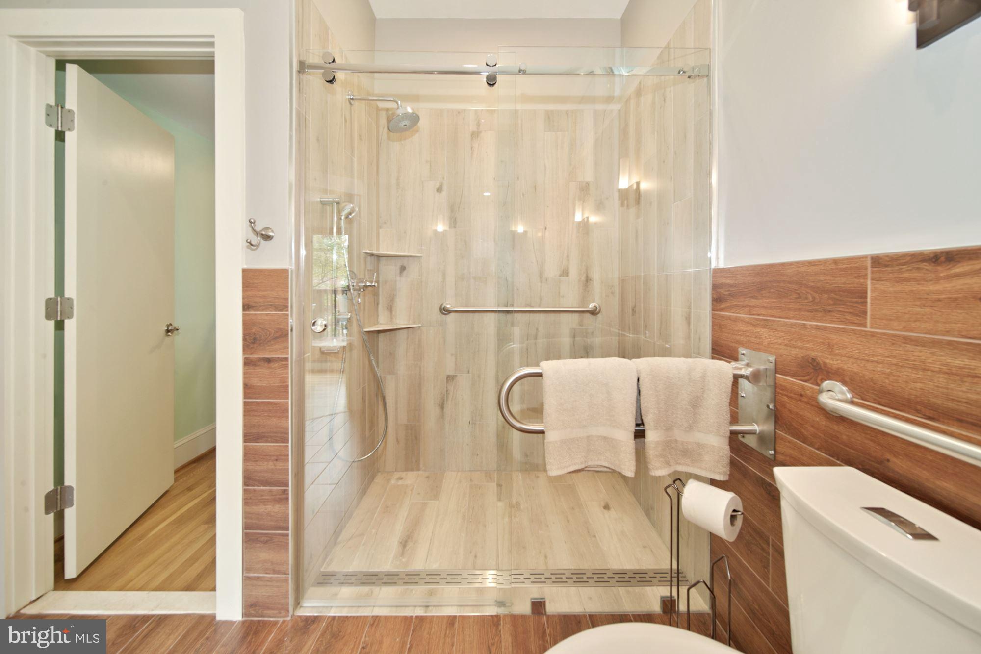 5211 Goddard Road Bethesda, MD 20814 - Photo 26 of 41 Zero-threshold shower in new bathroom