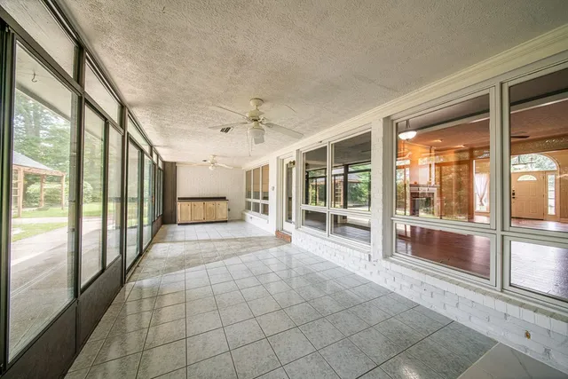 a spacious bathroom with a large mirror