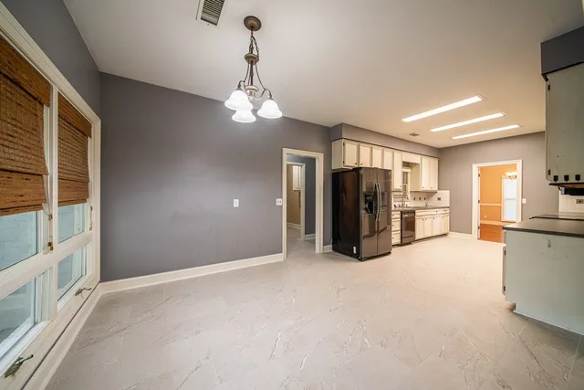 a view of a livingroom with a furniture