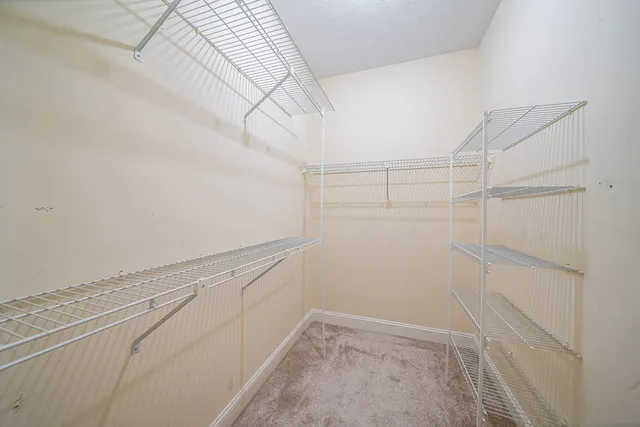 a view of a room with racks on the wall