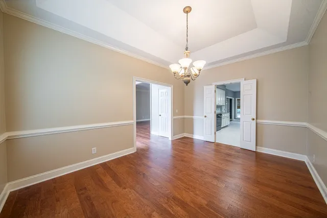 a view of a livingroom with wooden floor