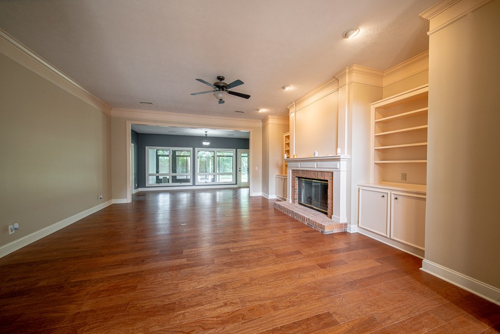 5 Mink Court Midland, GA 31820 - Photo 10 of 42 a view of an empty room with window and wooden floor