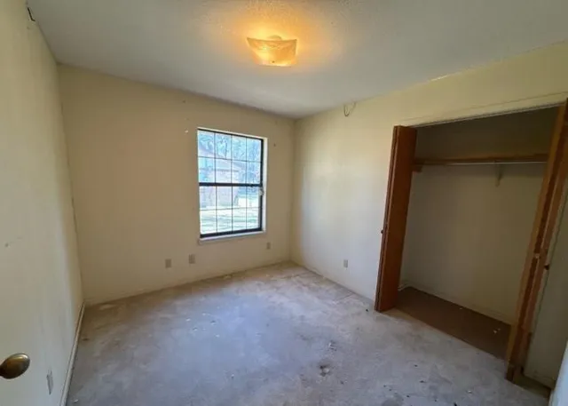 an empty room with windows