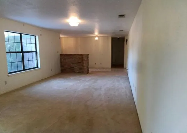 an empty room with windows