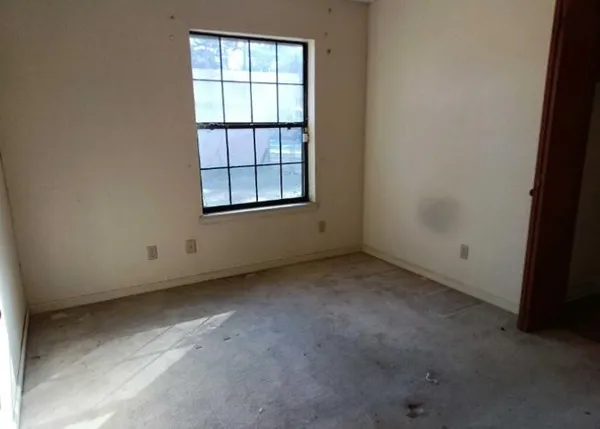 an empty room with a window
