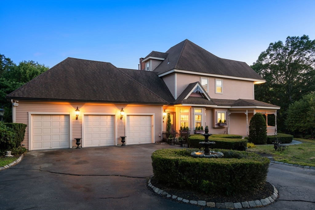 2 Country Way Hopkinton, MA 01748 - Photo 3 of 38 a front view of house with yard and green space