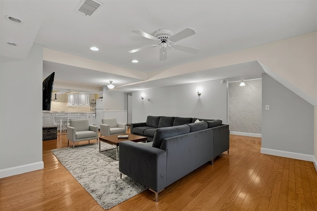 2 Country Way Hopkinton, MA 01748 - Photo 32 of 38 a living room with furniture and a wooden floor