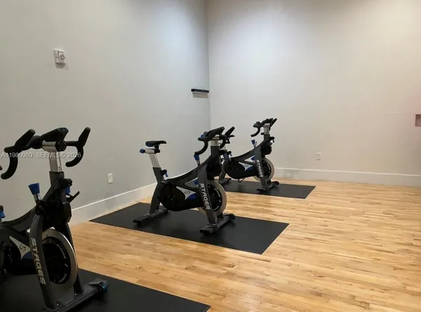 a bathroom with a sink and gym equipment