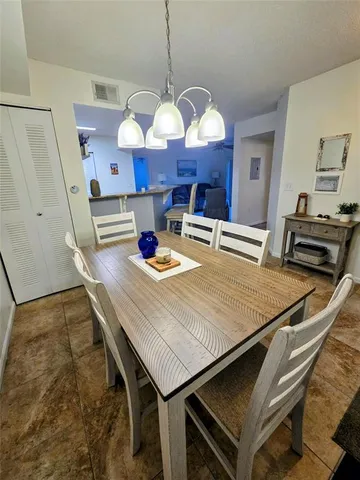 a view of living room with granite countertop furniture and fireplace