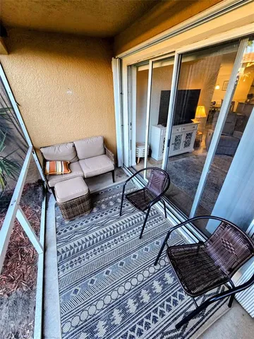 a kitchen with a sink a stove and cabinets