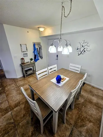 a bedroom with furniture and window