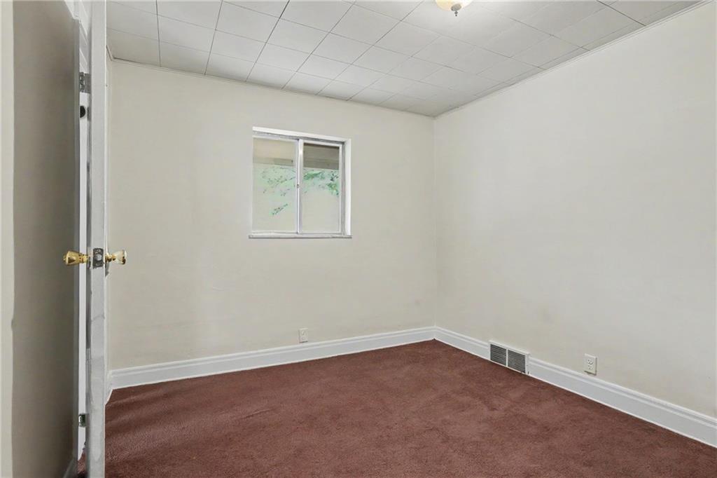 218 Vine Street Homestead, PA 15120 - Photo 15 of 36 an empty room with windows