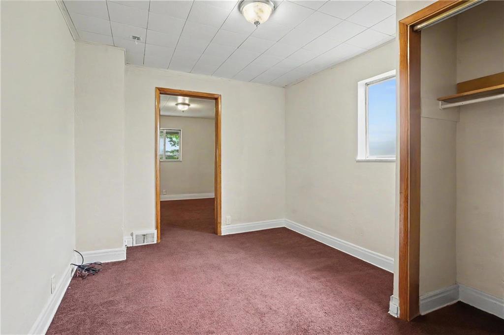 218 Vine Street Homestead, PA 15120 - Photo 17 of 36 an empty room with windows