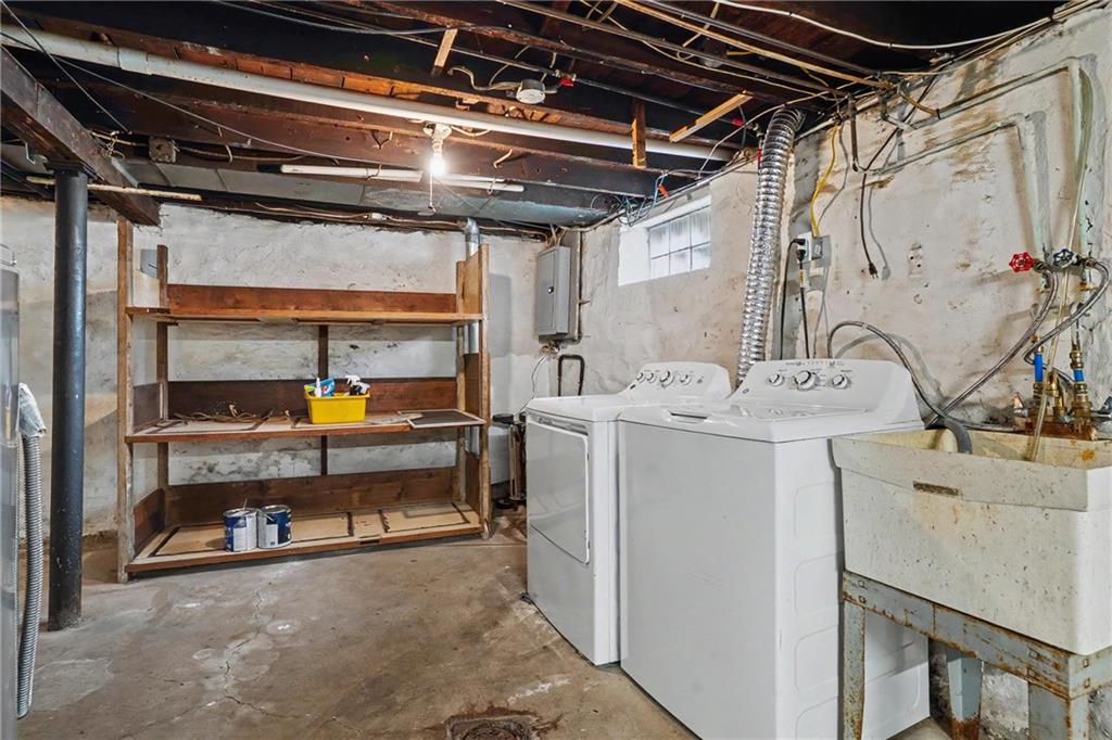 218 Vine Street Homestead, PA 15120 - Photo 24 of 36 a utility room with dryer and washer