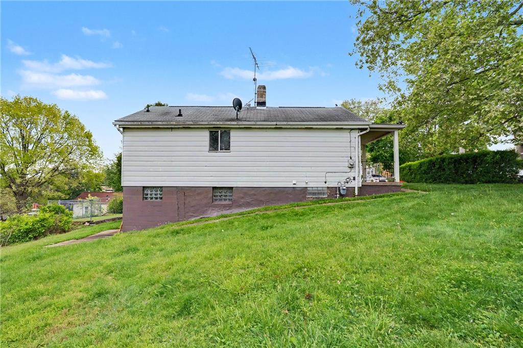 218 Vine Street Homestead, PA 15120 - Photo 28 of 36 a view of a house with a yard